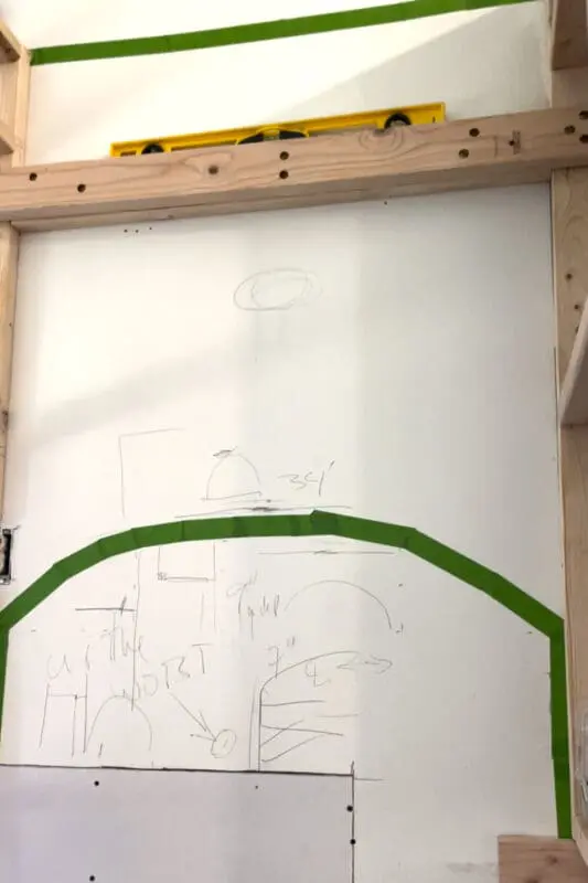 Lag bolts on cross beam for support for range hood.